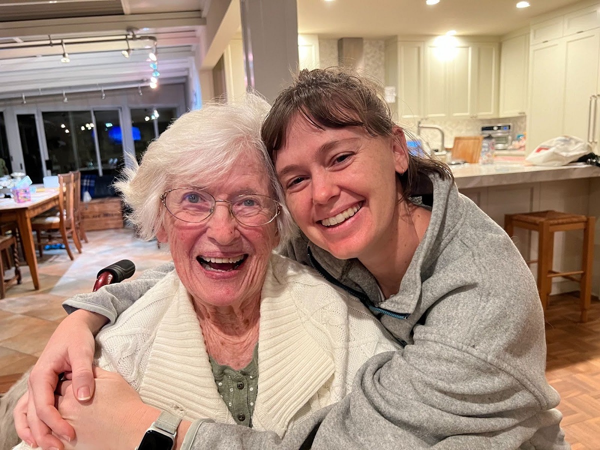 CI Public Program Manager, Tori Sarris, Hugging her Grandmother, Margaret "Peggy" Irene Cole Hall Stickler